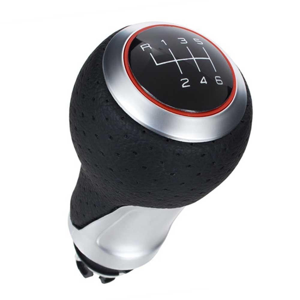 Fekete színű, krómozott 6 sebességes Audi váltógomb. Piros és króm számlapkerettel.