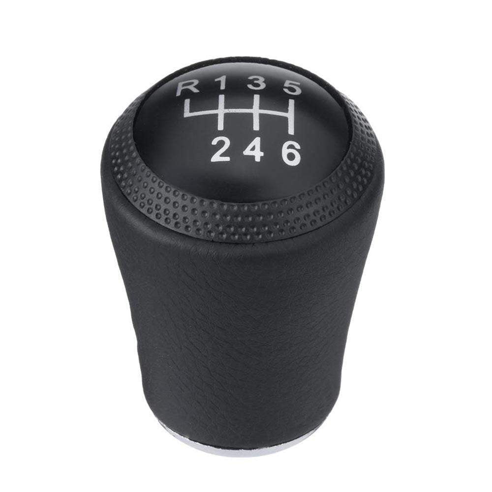 Fekete színű, műbőr anyagú 6 sebességes Audi váltógomb. 6 fokozatos, fekete számlappal.