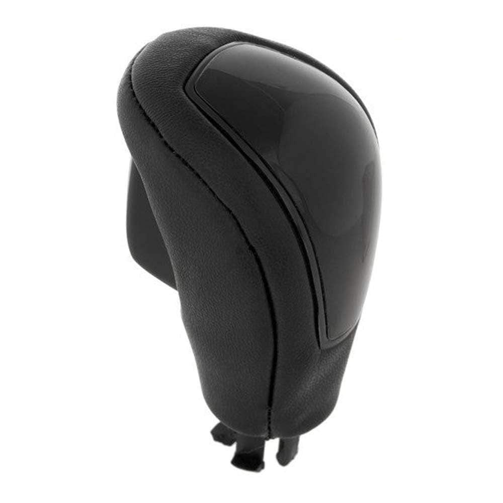 Fekete színű, bőrözött automata Ford váltógomb. Fekete színű üveg számlappal.